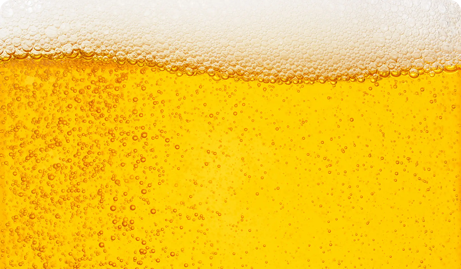 Golden beer with frothy foam on top.